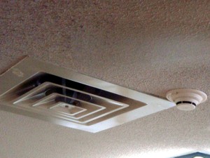 Often, the HVAC people install their air diffuser at a convienent place for them, and don't know the consequences for the fire alarm smoke detector.